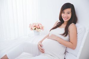 Pregnant girl smiling