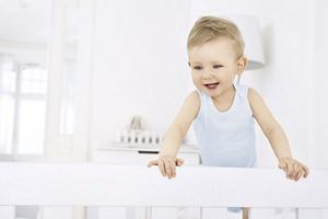 baby stood up in cot