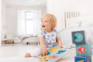 toddler playing on the floor