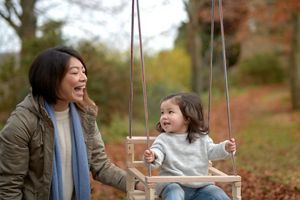 kid on swing