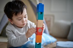 toddler playing with toys