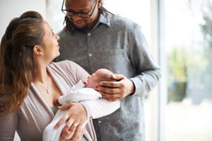 parents and newborn baby