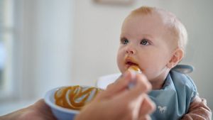 Baby Being Spoon Fed