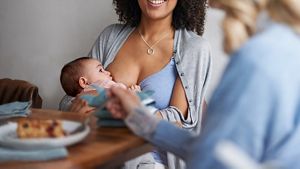 Baby Breastfeeding At Lunch