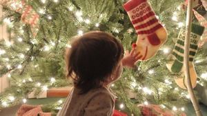 Baby By Christmas Tree