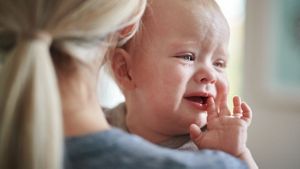 Baby Crying On Mums Shoulder