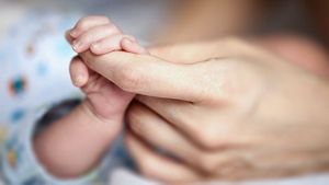 Baby Hand Holding Parents Finger
