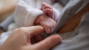Baby Holding Finger