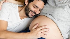 Dad Bonding With Baby Bump Week 23