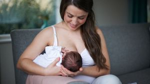Mother Breastfeeding Newborn Baby