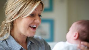 Mother Smiling At Baby