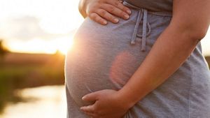 Mum To Be At Sunset