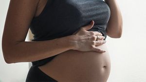 Pregnant Woman In Grey