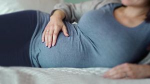 Pregnant Woman Lying On Her Side