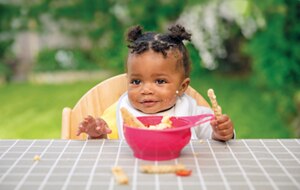 toddler-eating-breadsticks.png