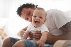 dad-playing-baby-boy