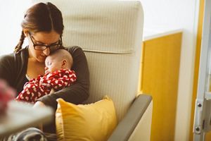 mum-sitting-baby-asleep