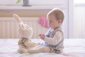 baby-staring-bunny-teddy