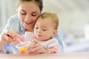 mom-with-baby-eating