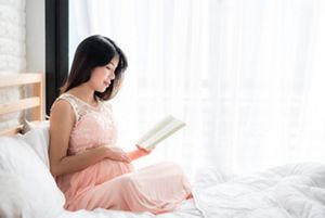 pregnant-bed-reading-book.jpg